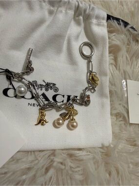 Coach Two-Tone Silver and Gold Pearl Charm Bracelet